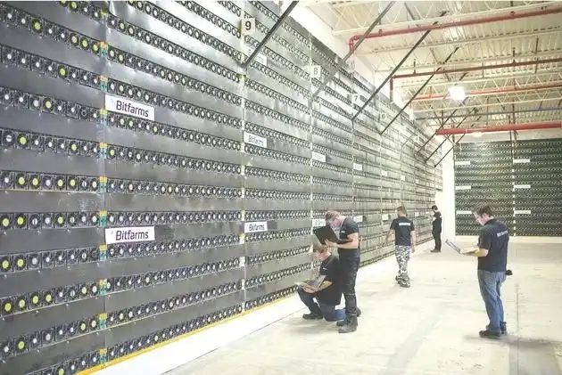 Cryptocurrency mining farm with rows of mining rigs