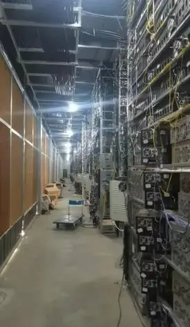 A close-up shot of a powerful ASIC miner, showcasing its intricate circuit boards and heat sinks, highlighting the technological prowess required for efficient Dogecoin mining.
